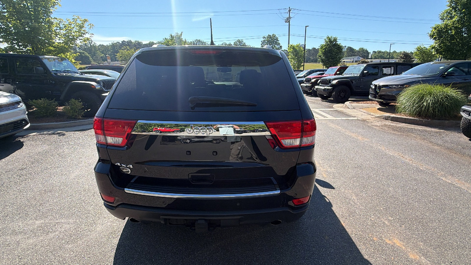 Used 2012 Jeep Grand Cherokee Overland Summit AWD/4WD image 9