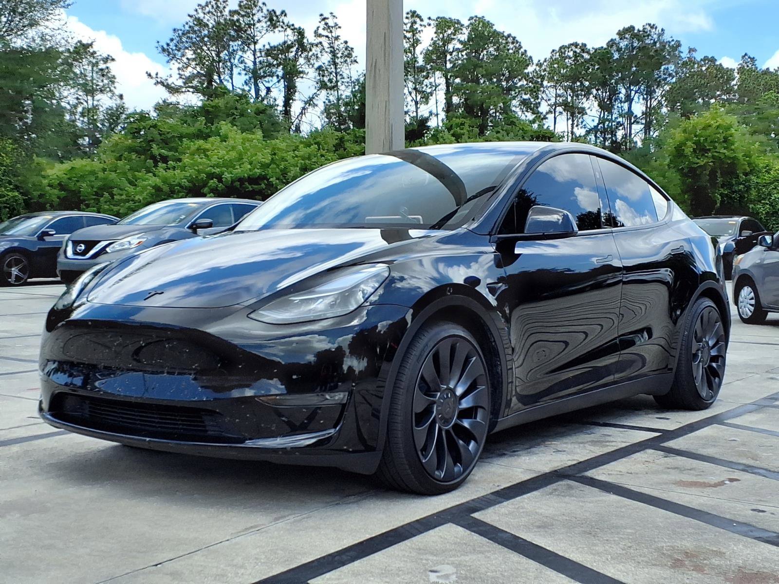 Used 2025 Tesla Model Y Performance AWD/4WD image 1