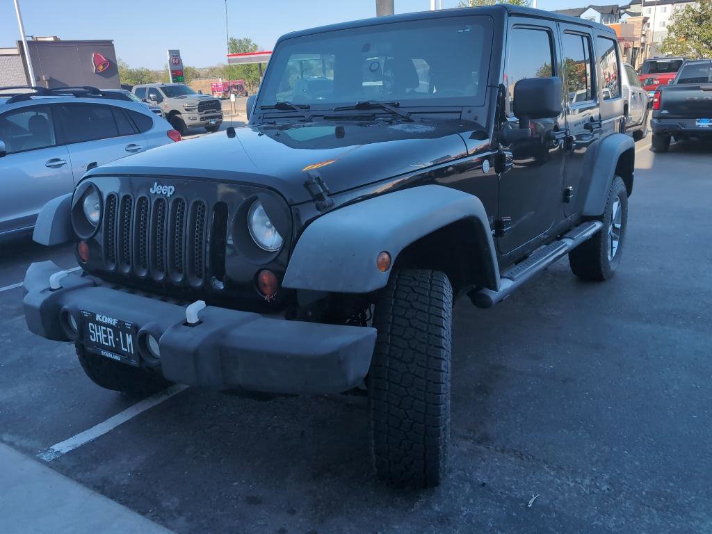 Used 2011 Jeep Wrangler Unlimited Sport AWD/4WD image 1