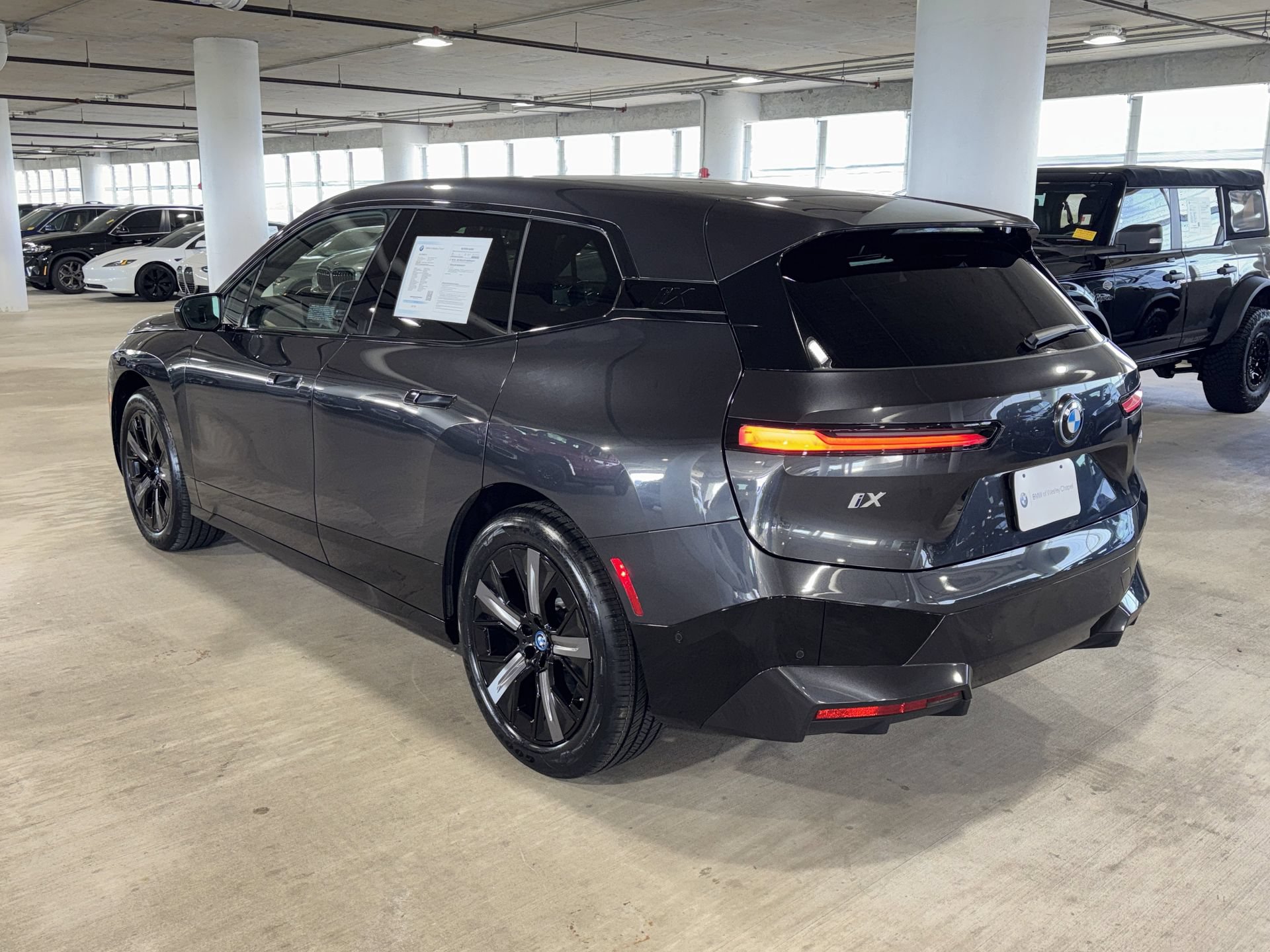 Used 2025 BMW iX xDrive50 w/ Sport Package AWD/4WD image 5