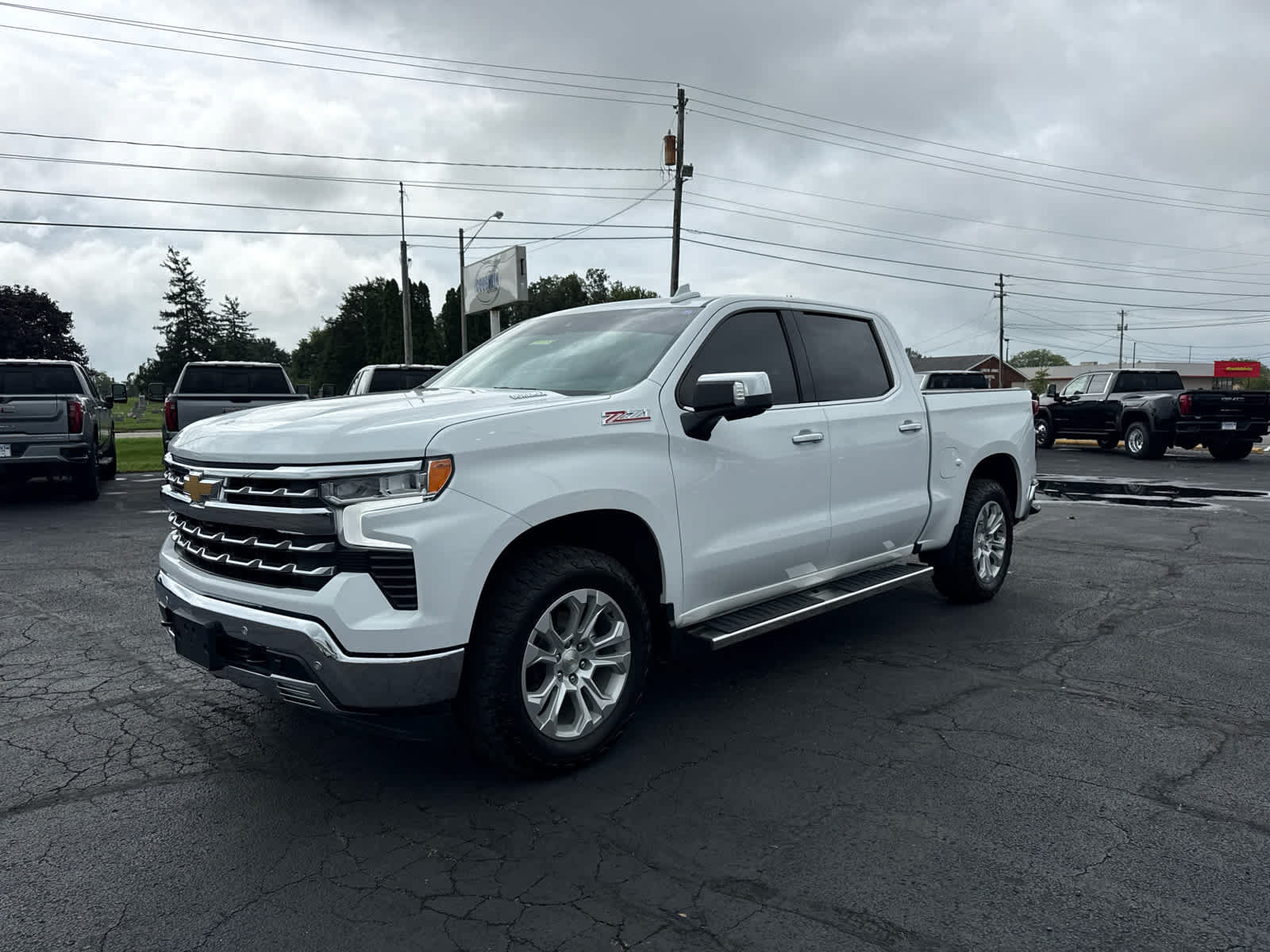 Certified 2023 Chevrolet Silverado 1500 LTZ w/ Z71 Off-Road Package AWD/4WD image 1