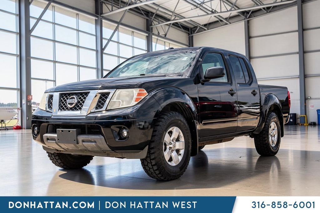 Used 2012 Nissan Frontier SV w/ SV Premium Utility Pkg AWD/4WD image 1
