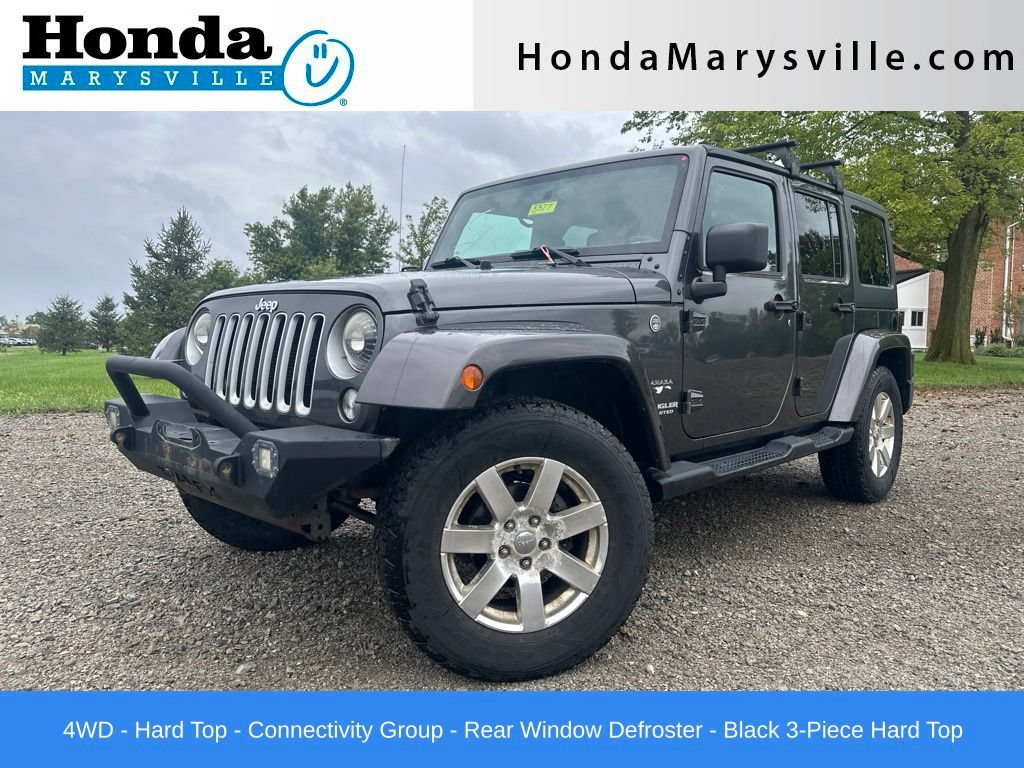 Used 2016 Jeep Wrangler Unlimited Sahara w/ Dual Top Group AWD/4WD video 1