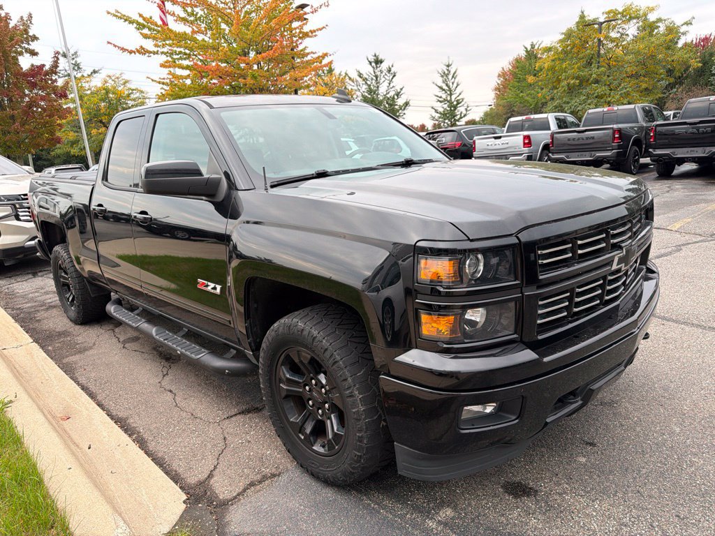 Used 2015 Chevrolet Silverado 1500 LT w/ Midnight Edition AWD/4WD image 1