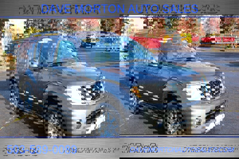 Used 2011 Nissan Pathfinder LE image 1