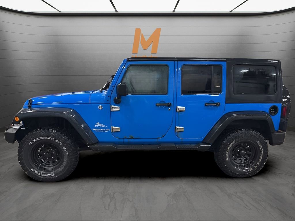 Used 2011 Jeep Wrangler Unlimited Sport w/ Trailer Tow Group AWD/4WD image 2
