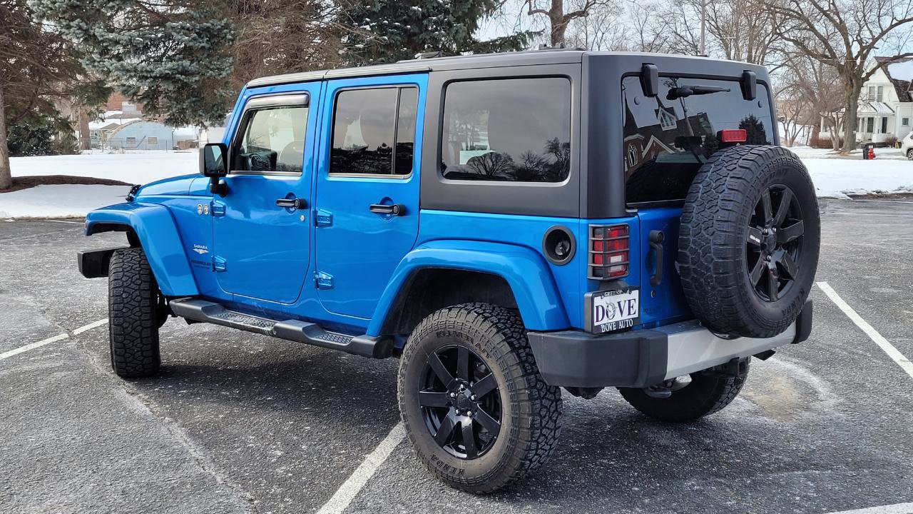Used 2014 Jeep Wrangler Unlimited Sahara w/ Dual Top Group AWD/4WD image 4