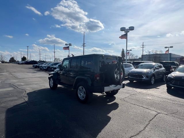 Used 2011 Jeep Wrangler Unlimited Sahara w/ Dual Top Group AWD/4WD image 6