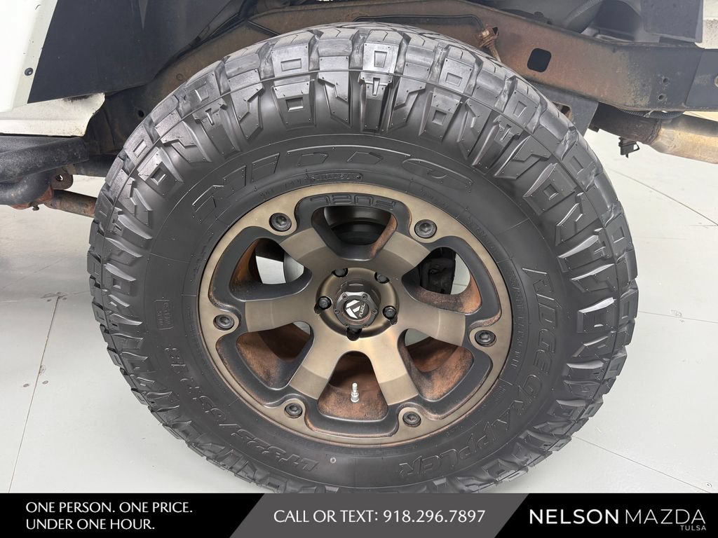 Used 2014 Jeep Wrangler Unlimited Sahara w/ Mopar Chrome Edition Group AWD/4WD image 12