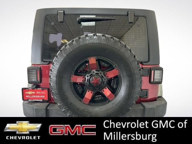 Used 2012 Jeep Wrangler Unlimited Sport AWD/4WD image 11
