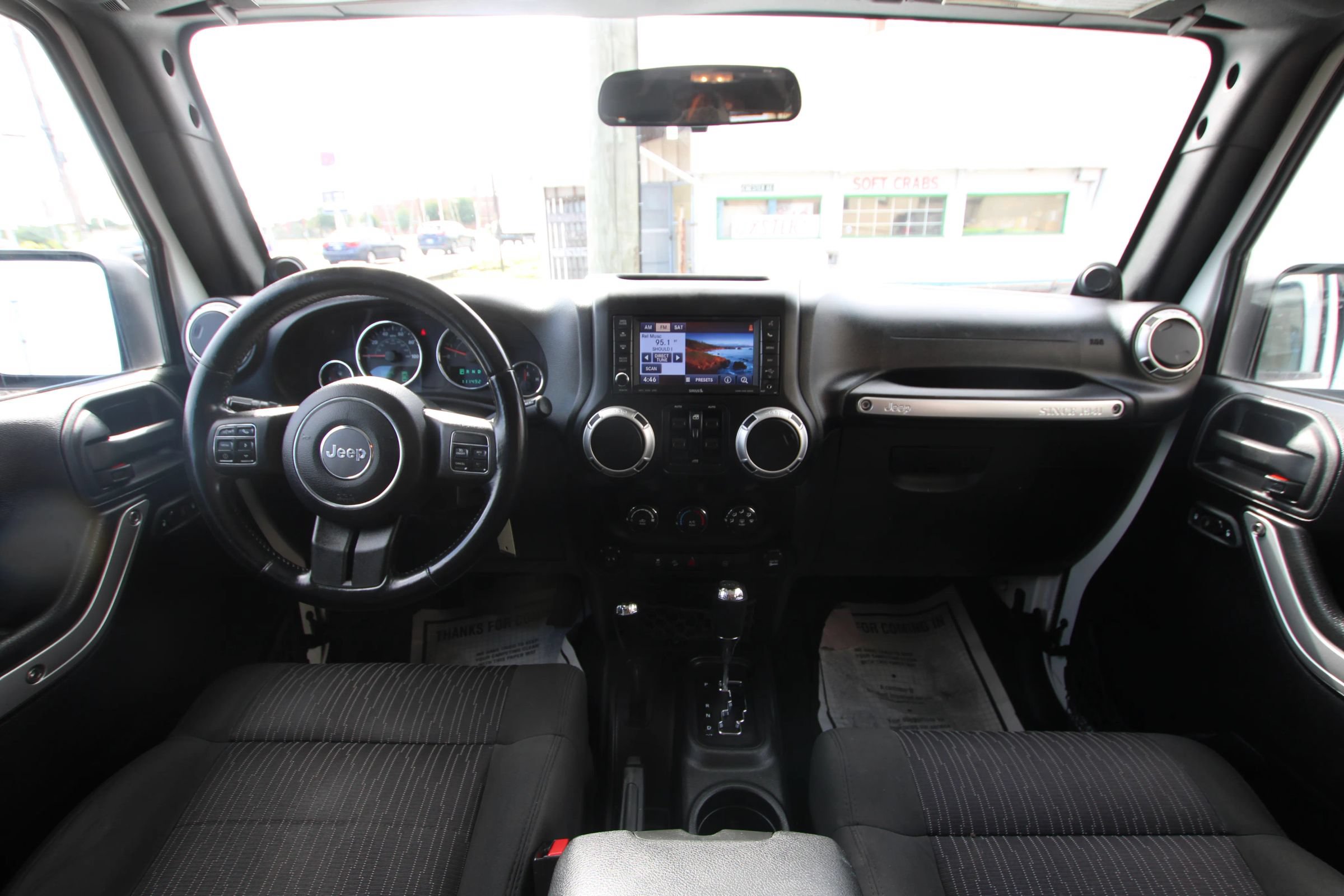 Used 2012 Jeep Wrangler Unlimited Sahara w/ Dual Top Group AWD/4WD image 13