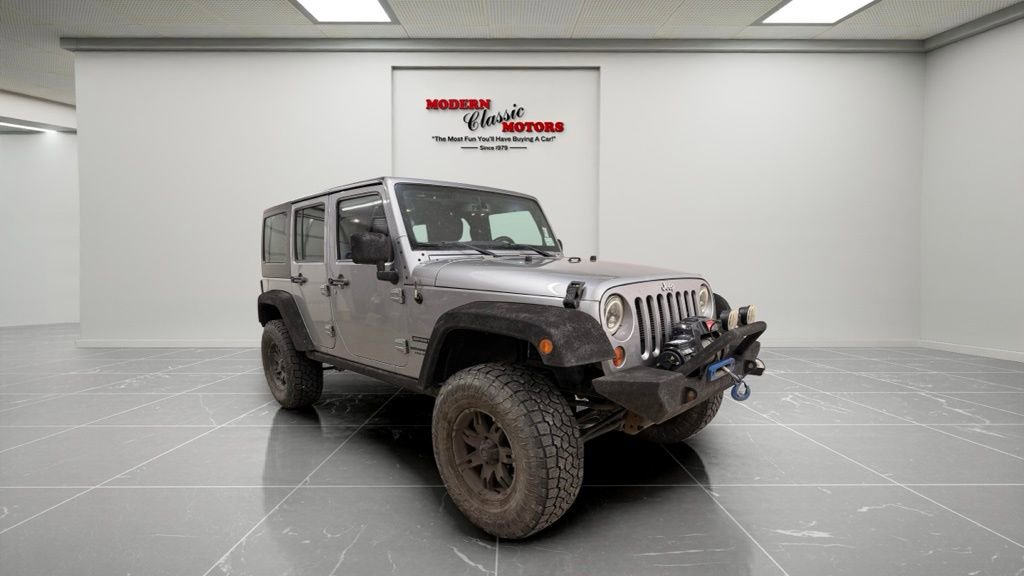 Used 2013 Jeep Wrangler Unlimited Sport image 1
