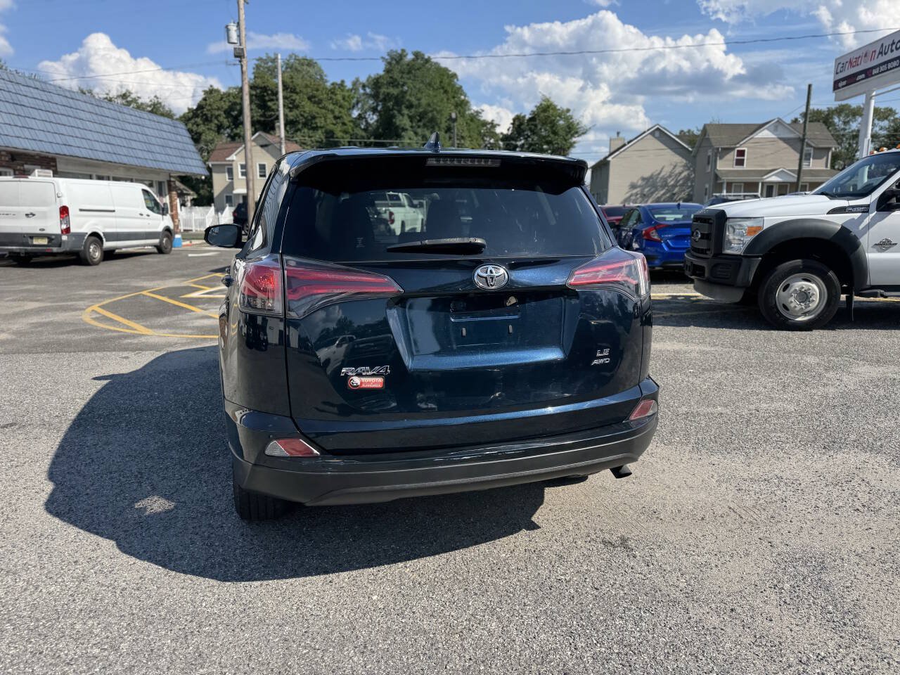 Used 2018 Toyota RAV4 LE w/ All Weather Liner Package AWD/4WD image 12