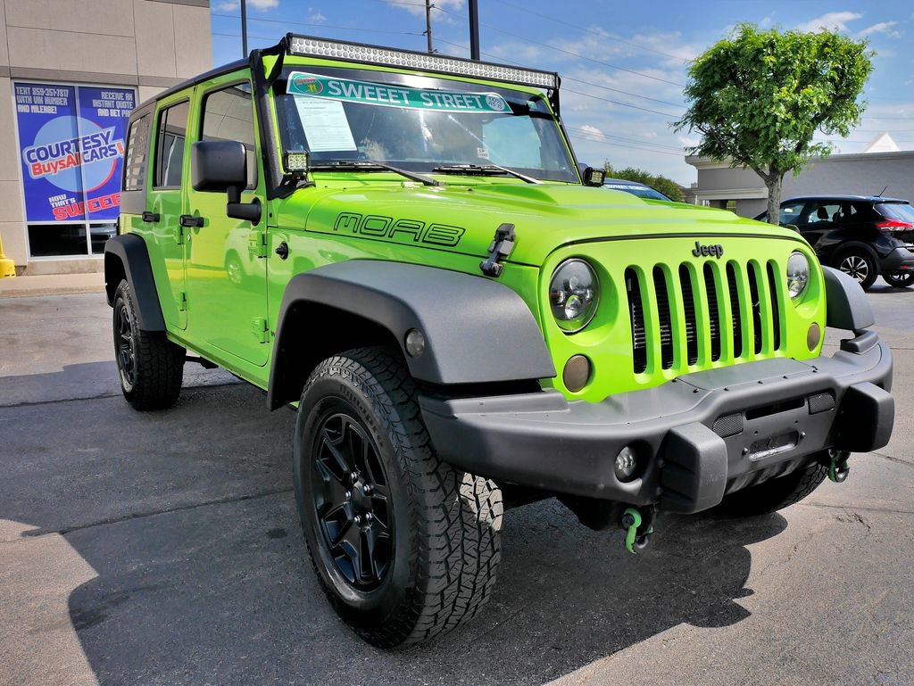 Used 2013 Jeep Wrangler Unlimited Sahara AWD/4WD image 4