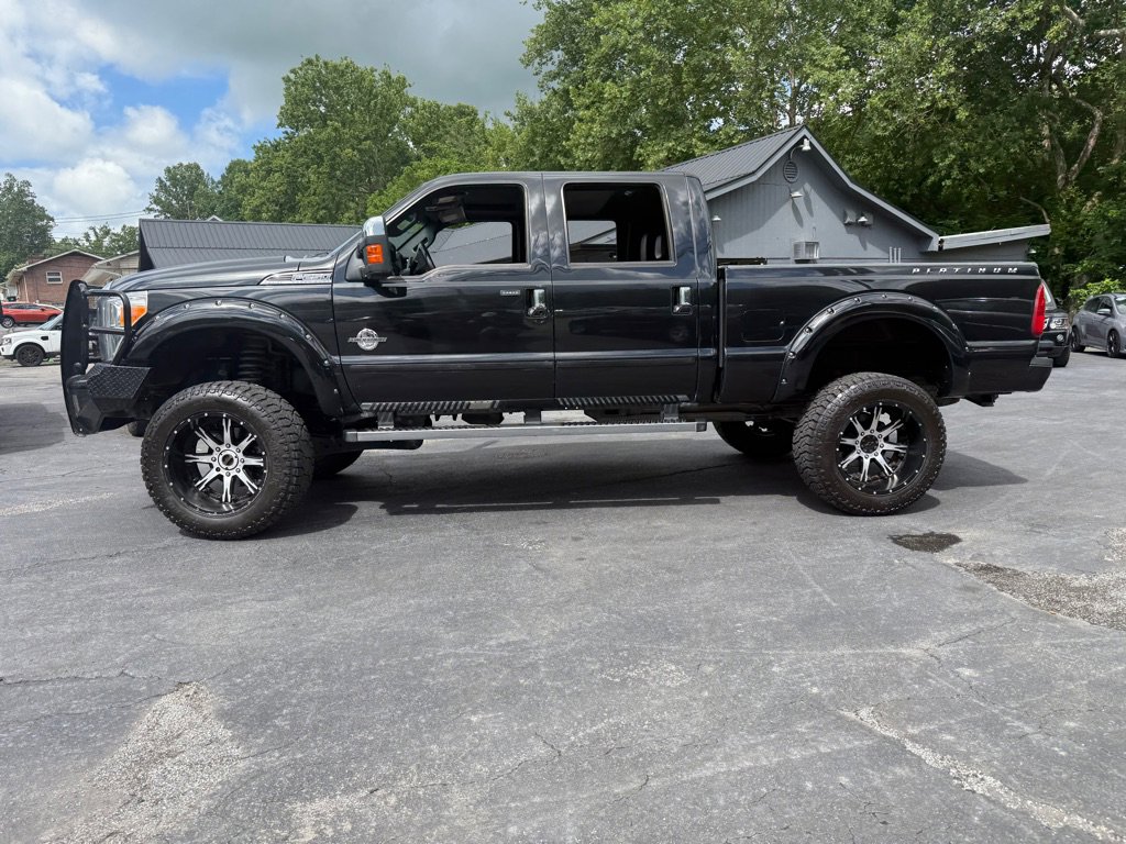 Used 2015 Ford F250 Platinum w/ FX4 Off-Road Package AWD/4WD image 1