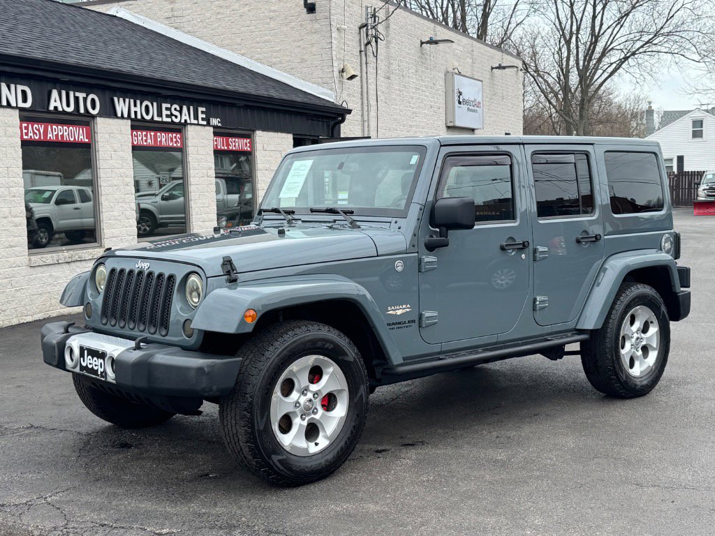Used 2014 Jeep Wrangler Unlimited Sahara w/ Max Tow Package image 1