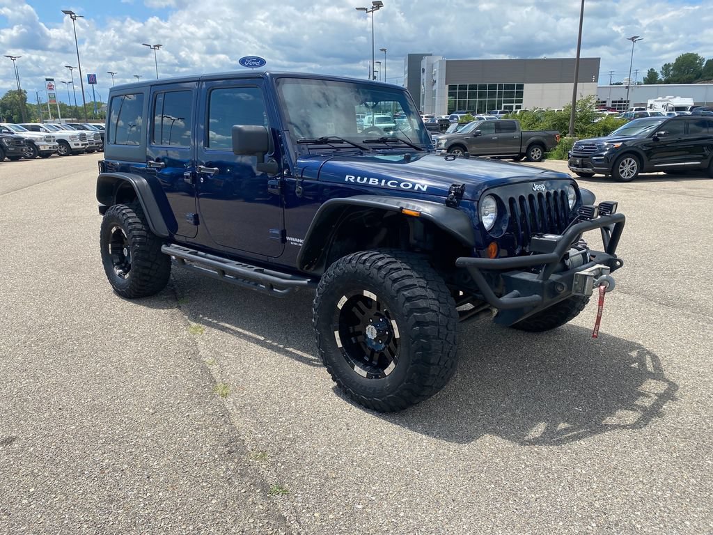 Used 2013 Jeep Wrangler Unlimited Rubicon w/ Dual Top Group AWD/4WD image 6