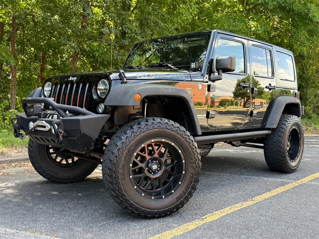Used 2015 Jeep Wrangler Unlimited Rubicon w/ Dual Top Group AWD/4WD image 2