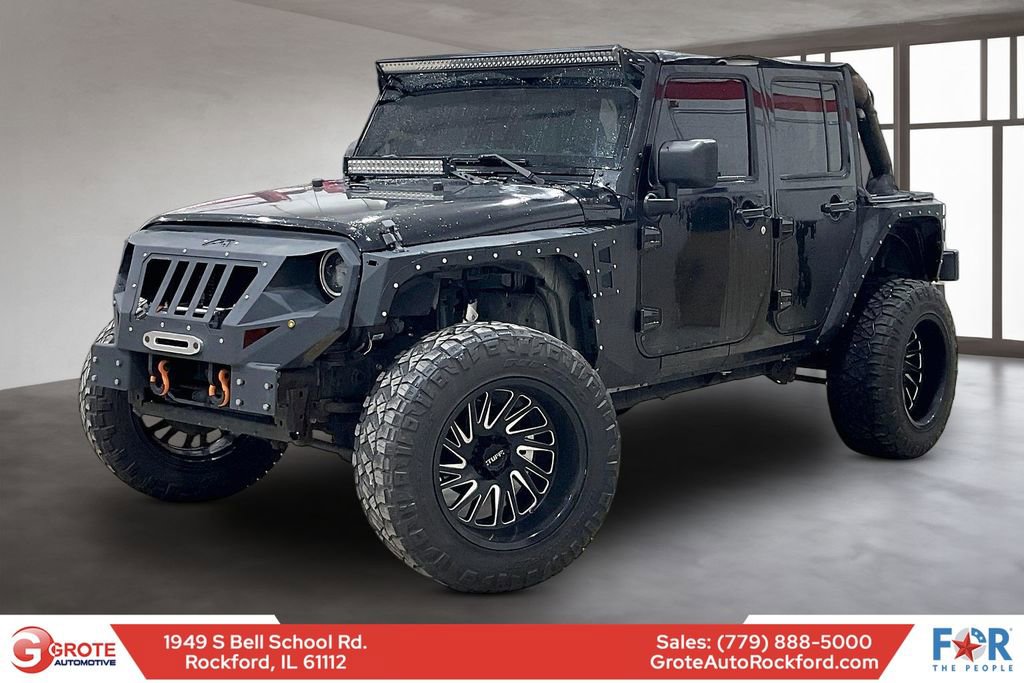 Used 2013 Jeep Wrangler Unlimited Sport image 1