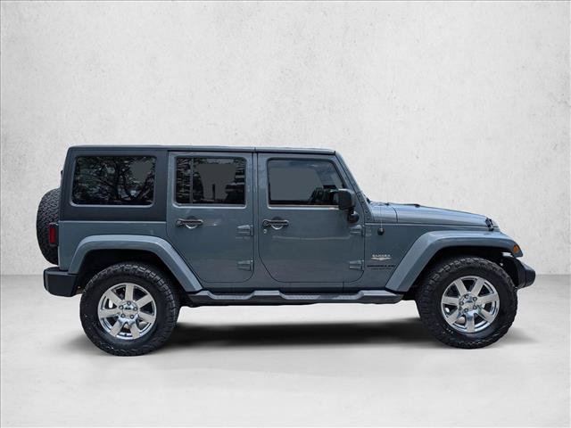 Used 2014 Jeep Wrangler Unlimited Sahara AWD/4WD video 4