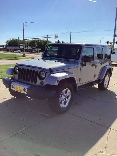 Used 2015 Jeep Wrangler Unlimited Sahara w/ Dual Top Group AWD/4WD image 1
