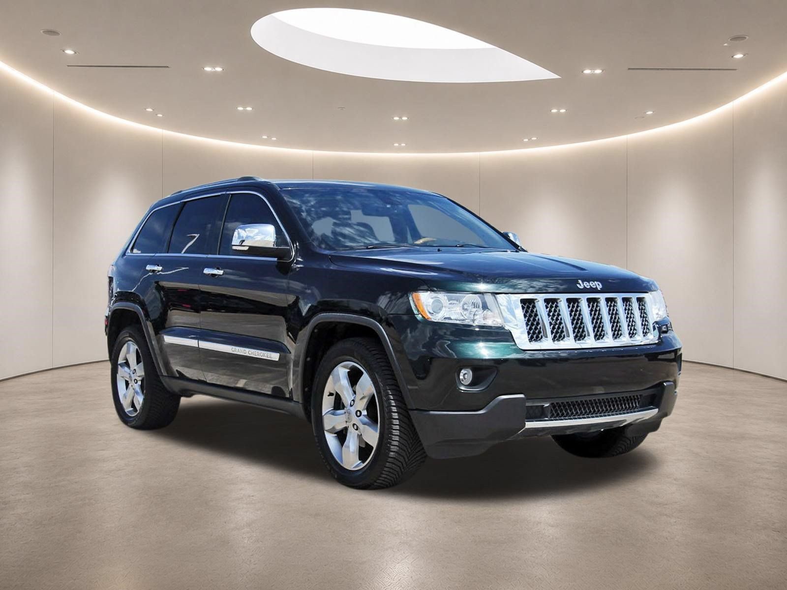 Used 2012 Jeep Grand Cherokee Overland RWD image 1
