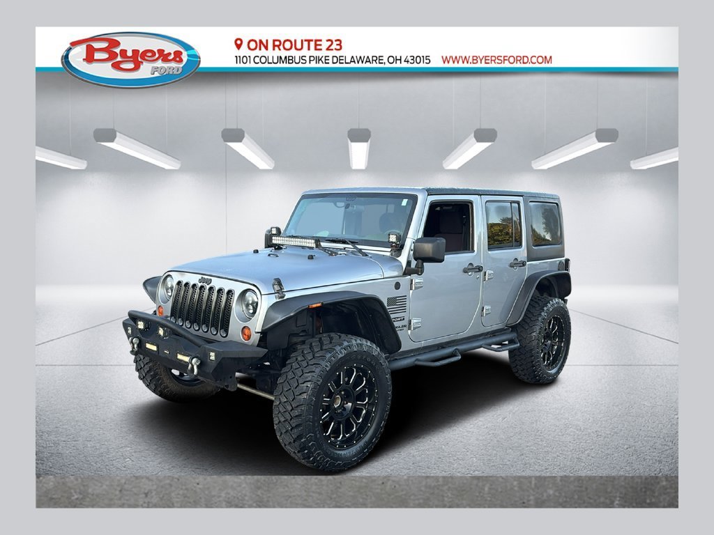 Used 2013 Jeep Wrangler Unlimited Sport w/ Mopar Black Appearance Group