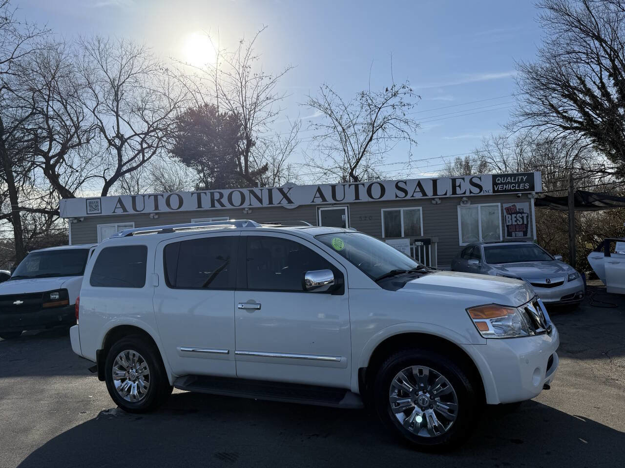 Used 2015 Nissan Armada Platinum w/ 2nd Row Captain Seat Package AWD/4WD image 1