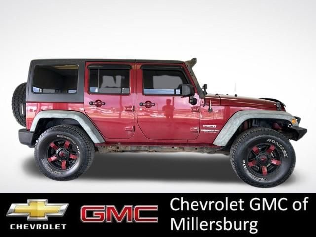 Used 2012 Jeep Wrangler Unlimited Sport AWD/4WD image 2