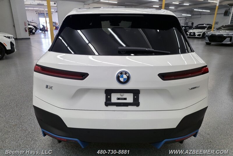 Used 2024 BMW iX xDrive50 w/ BMW I Signature Blue Package AWD/4WD image 7