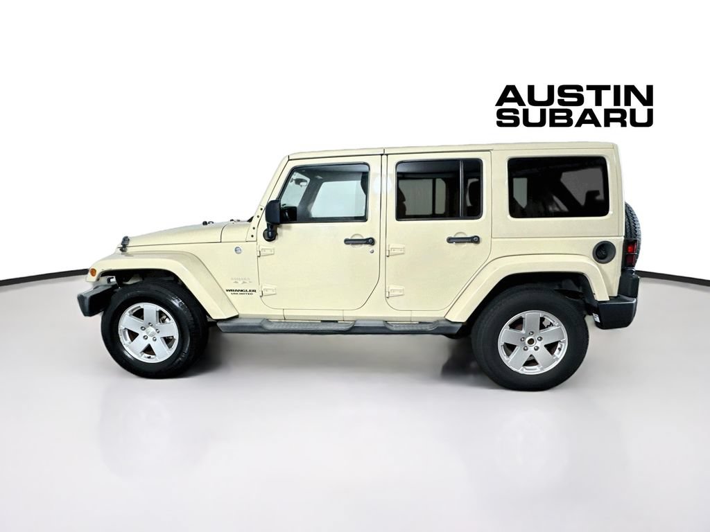 Used 2012 Jeep Wrangler Unlimited Sahara w/ Dual Top Group AWD/4WD image 4