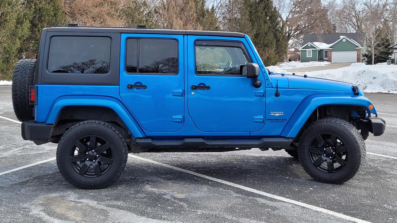 Used 2014 Jeep Wrangler Unlimited Sahara w/ Dual Top Group AWD/4WD image 8