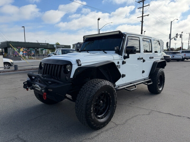 Used 2015 Jeep Wrangler Unlimited Sahara AWD/4WD image 1