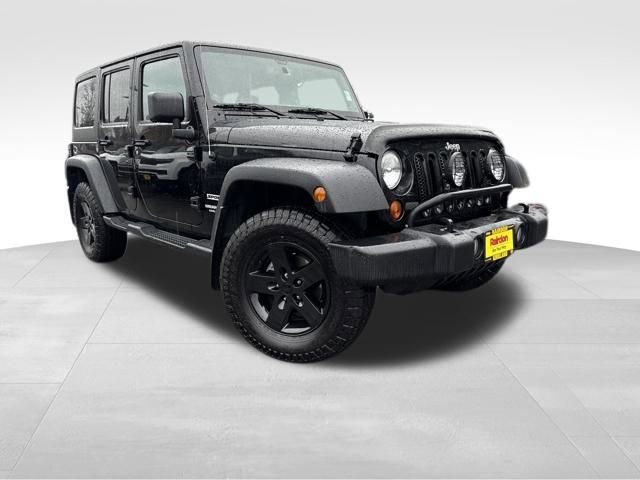 Used 2013 Jeep Wrangler Unlimited Sport