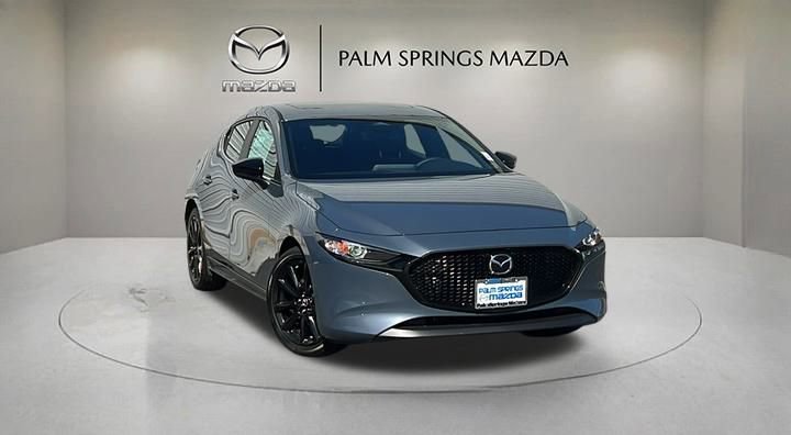 New 2025 MAZDA MAZDA3 Carbon AWD/4WD image 1