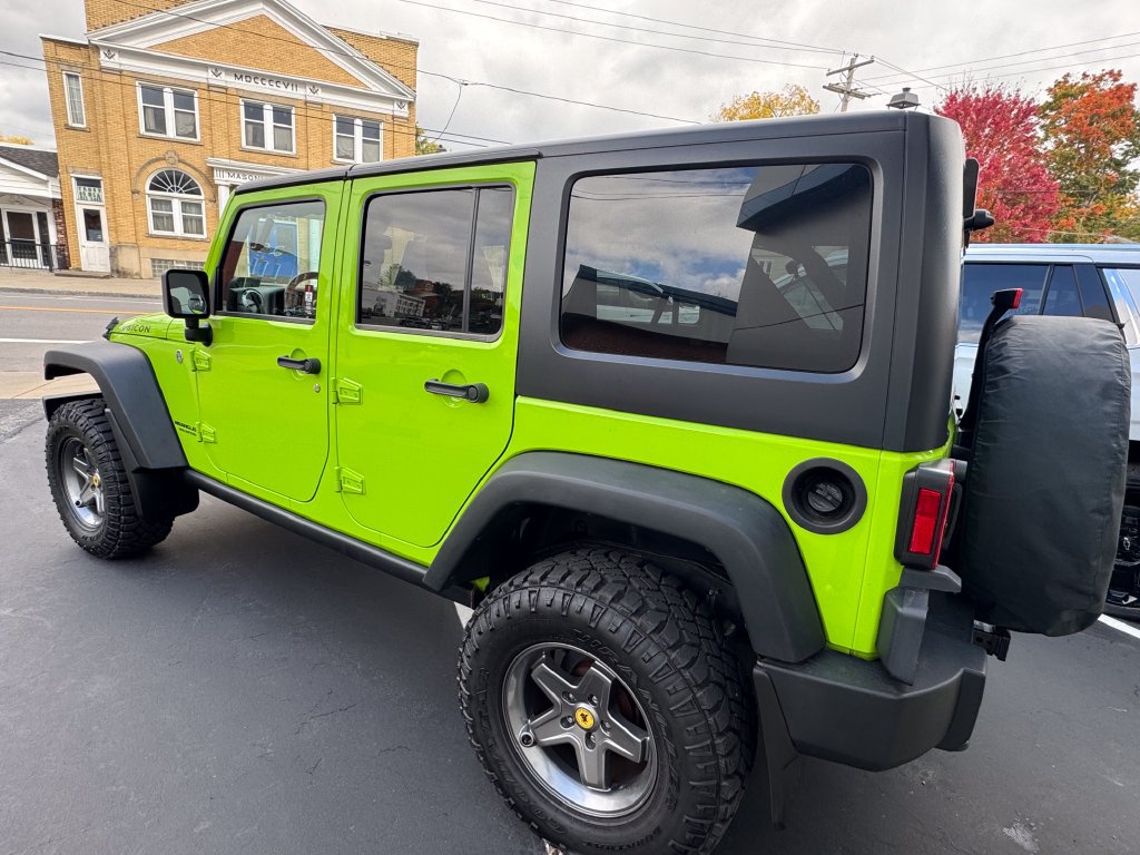 Used 2013 Jeep Wrangler Unlimited Rubicon w/ Dual Top Group AWD/4WD image 8
