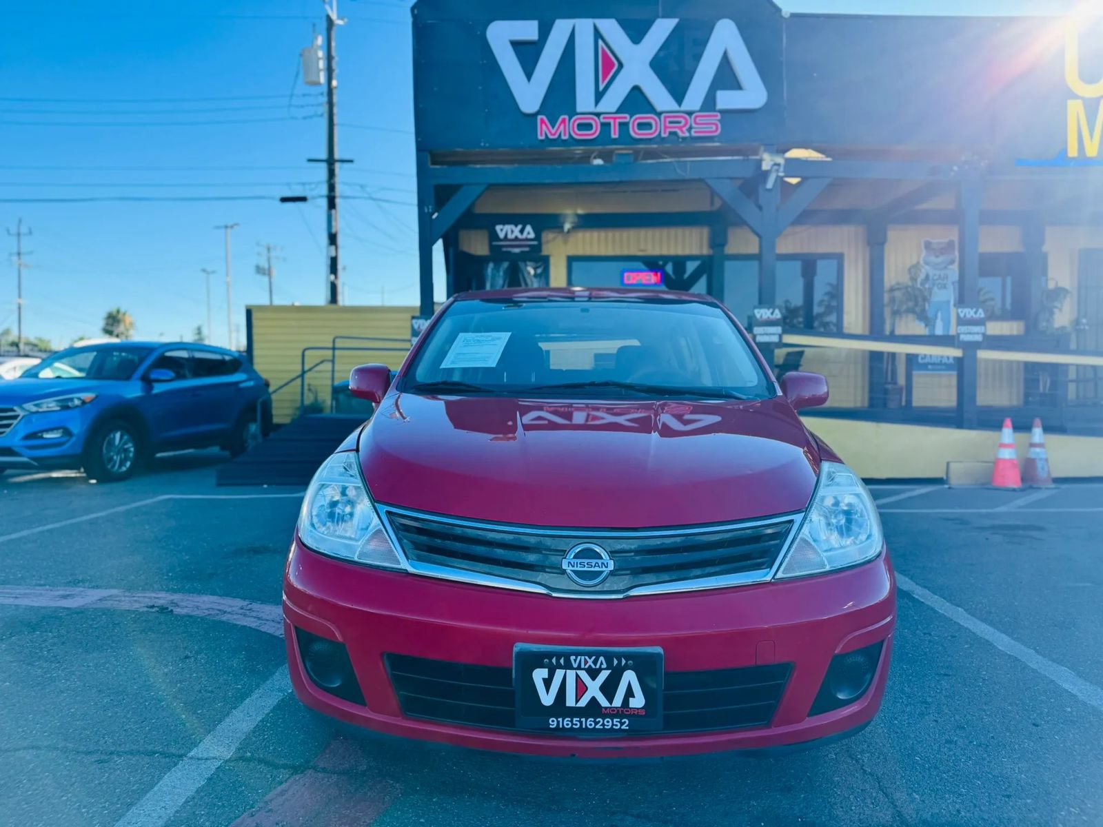 Used 2012 Nissan Versa 1.8 S w/ Plus Pkg FWD image 2