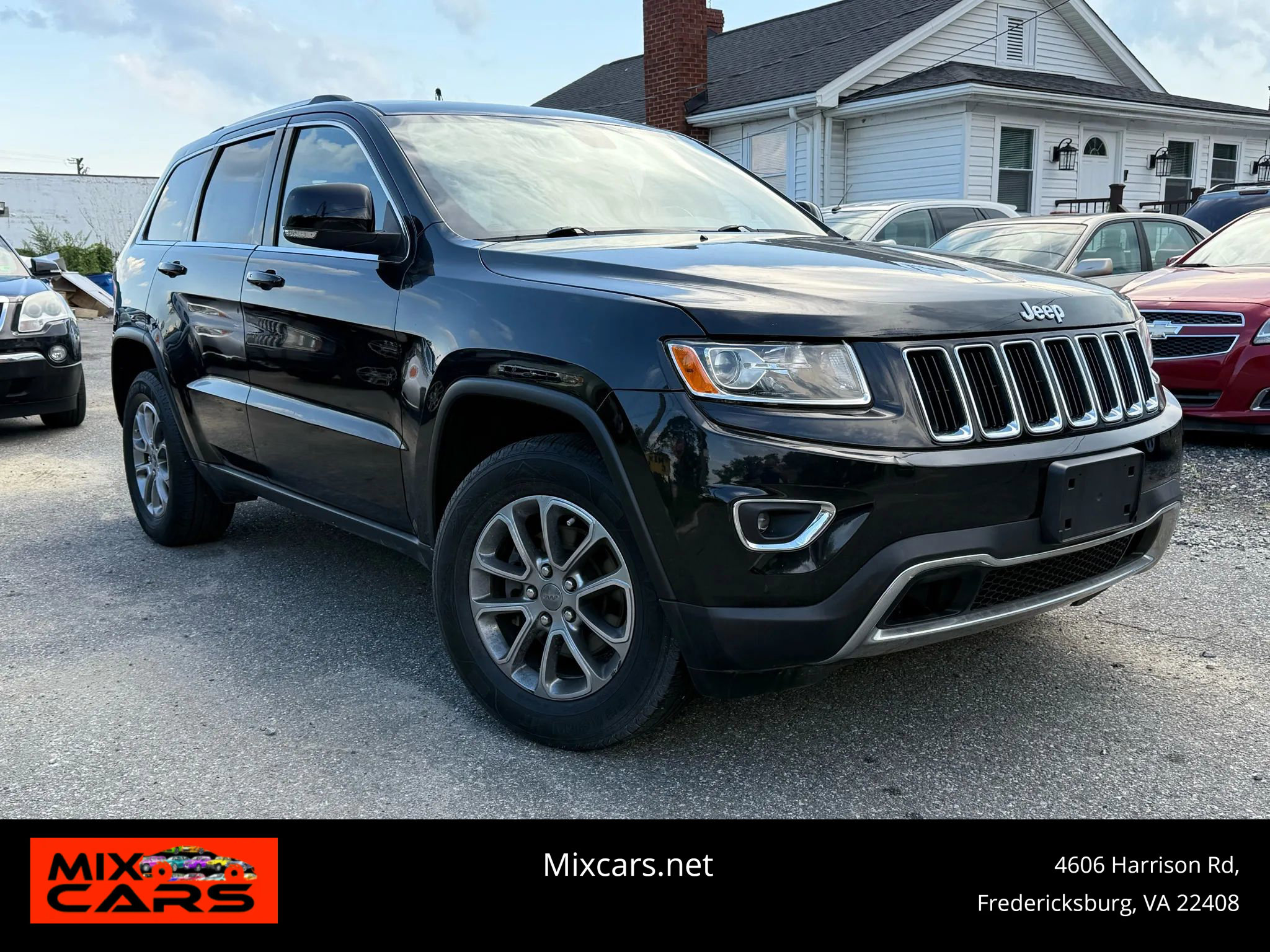 Used 2014 Jeep Grand Cherokee Limited AWD/4WD image 1