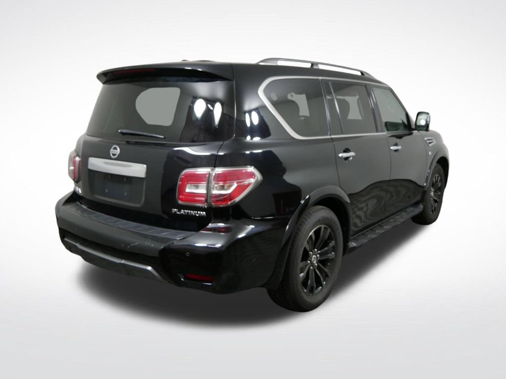 Used 2019 Nissan Armada Platinum w/ Captain's Chairs Package AWD/4WD video 3