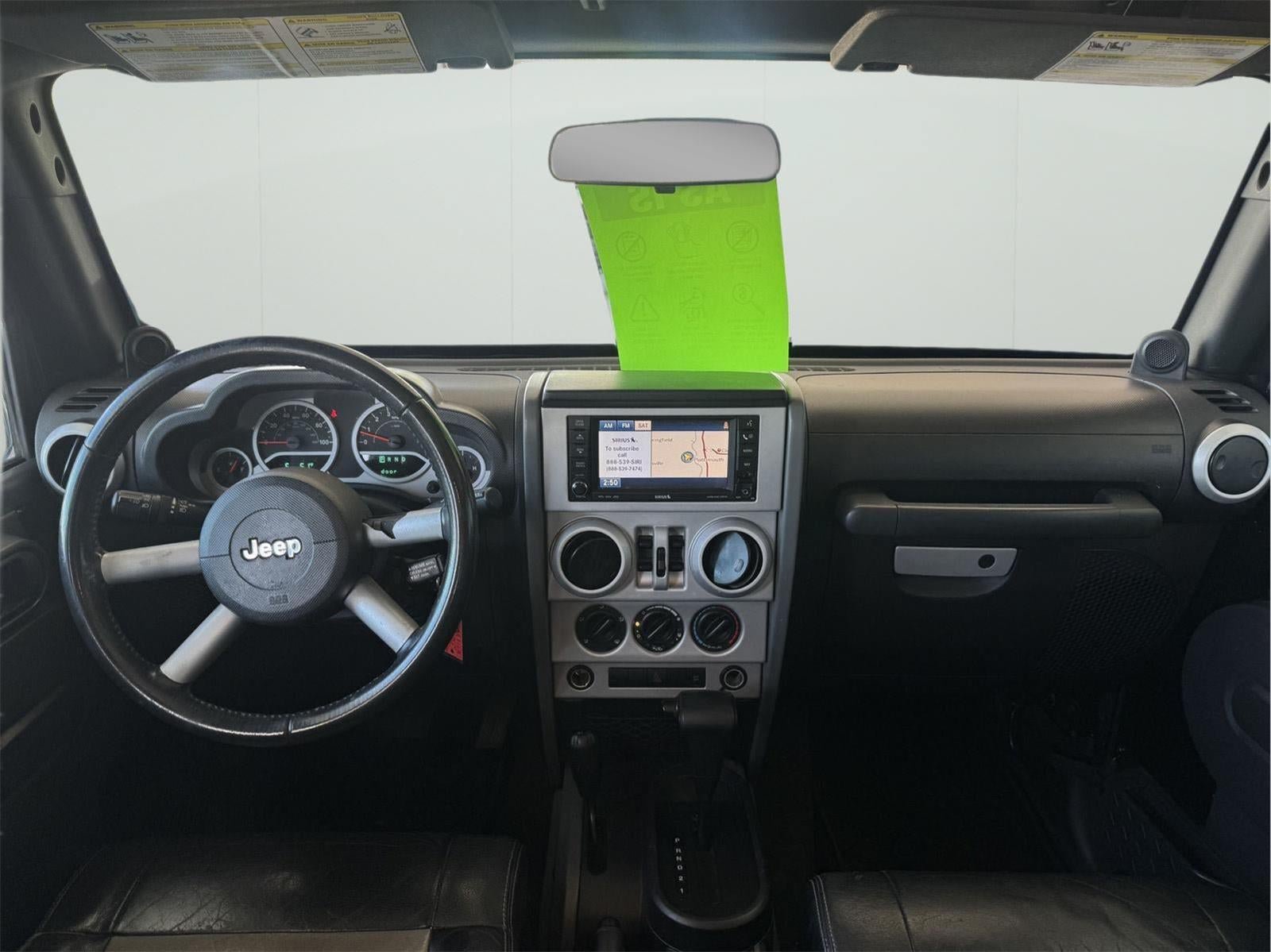 Used 2009 Jeep Wrangler Unlimited Sahara w/ Mopar Leather Group AWD/4WD image 13