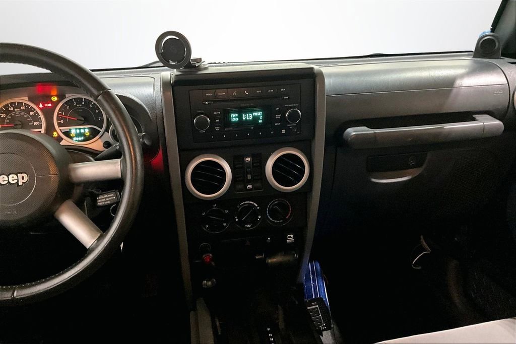 Used 2010 Jeep Wrangler Unlimited Sahara w/ Dual Top Group image 9