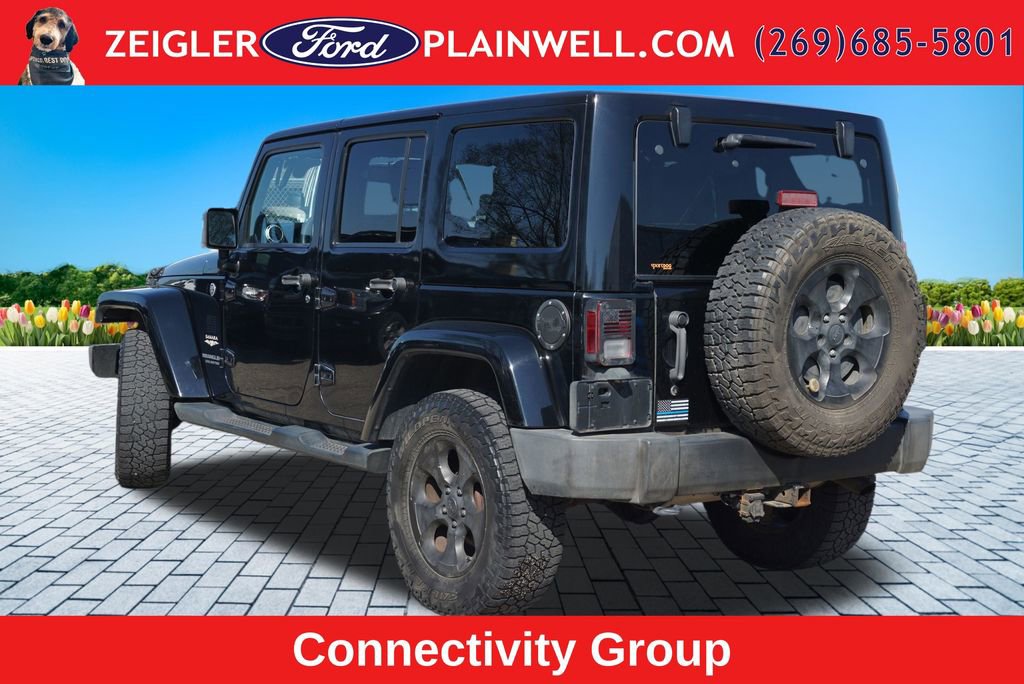 Used 2014 Jeep Wrangler Unlimited Sahara w/ Dual Top Group AWD/4WD image 3