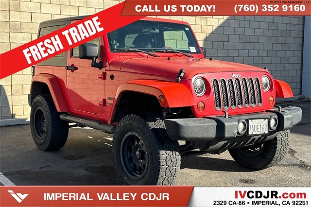 Used 2013 Jeep Wrangler Sport w/ Mopar Black Appearance Group image 1