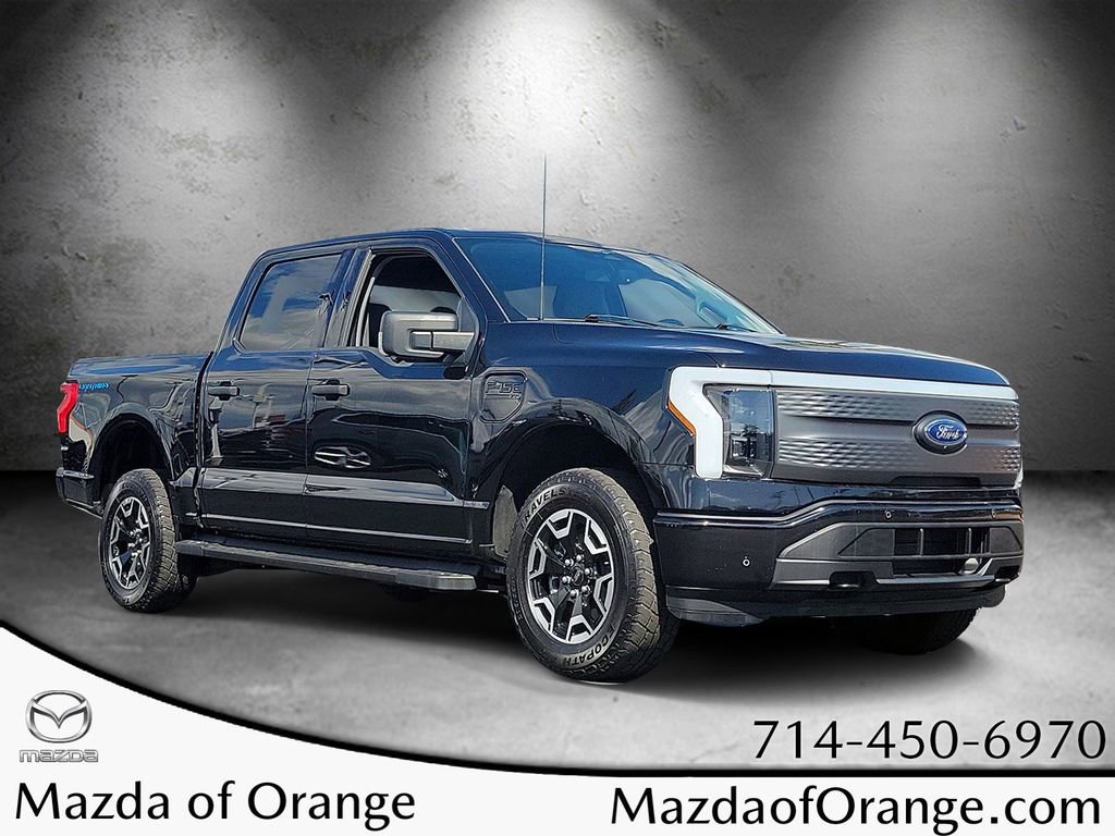Used 2023 Ford F150 Lightning XLT AWD/4WD image 1