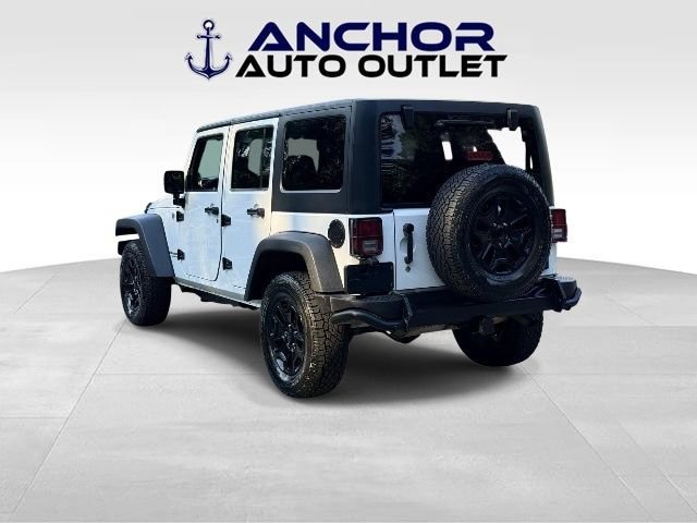 Used 2013 Jeep Wrangler Unlimited Sahara AWD/4WD image 6