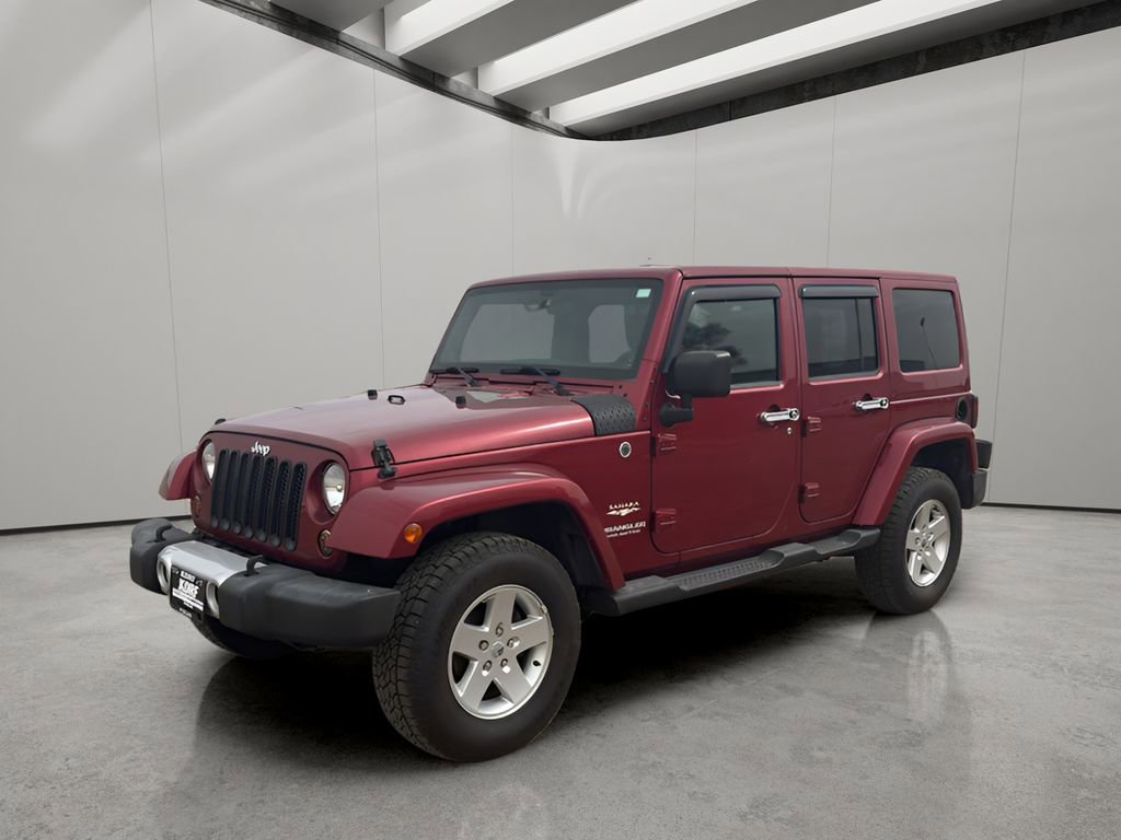 Used 2012 Jeep Wrangler Unlimited Sahara w/ Dual Top Group image 1