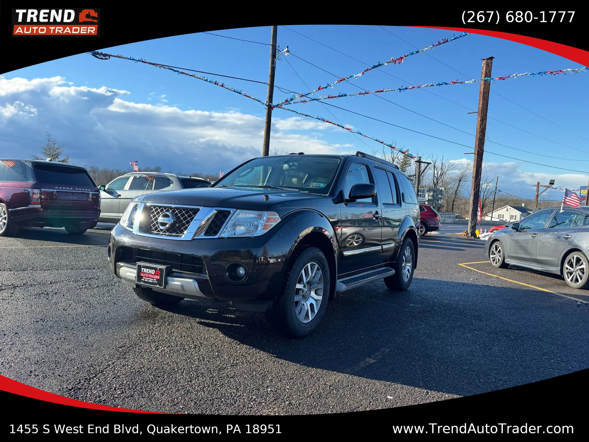 Used 2011 Nissan Pathfinder LE w/ Navigation Pkg image 1