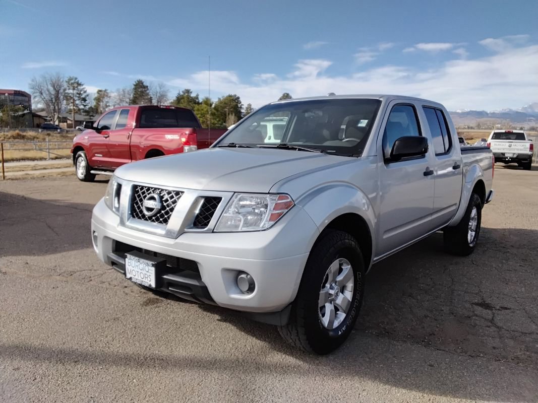 Used 2013 Nissan Frontier SV image 1