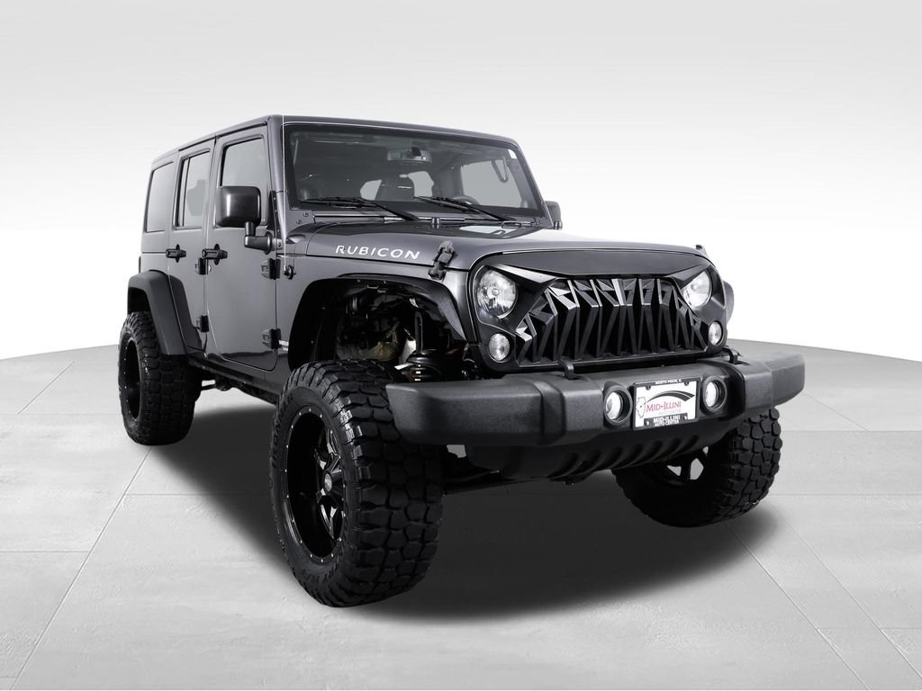 Used 2014 Jeep Wrangler Unlimited Rubicon w/ Dual Top Group AWD/4WD image 11
