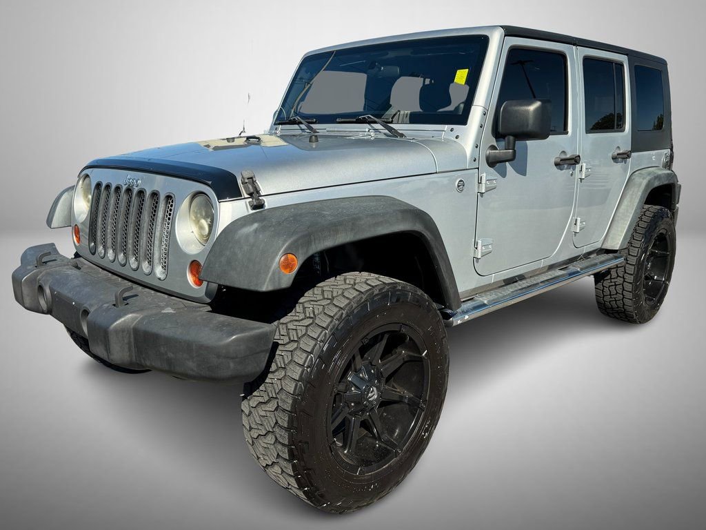 Used 2011 Jeep Wrangler Unlimited Sport AWD/4WD image 2